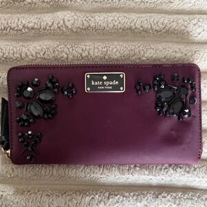 Kate Spade New York Wilson Road Embellished Wallet in deep plum Jeweled